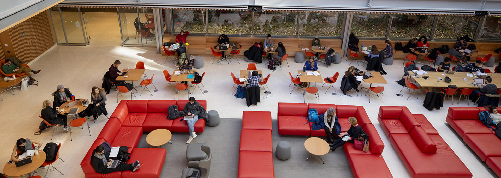 Couches with students working